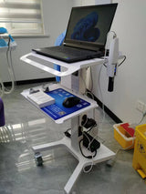 RIFE HA1 dental laptop cart in use at a dental clinic with intraoral scanner holder