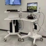 Two RIFE HA1 mobile dental workstations side by side - one with keyboard setup, one with laptop and intraoral scanner