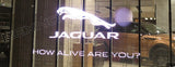 Transparent glass LED signage for shops and showrooms